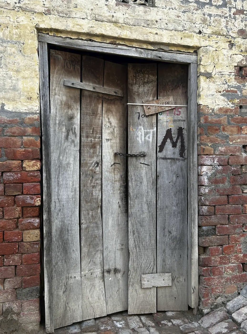 Exterior of a traditional dalit leather artisan Dilbag’s home in Kandela village, Jind district, Haryana.